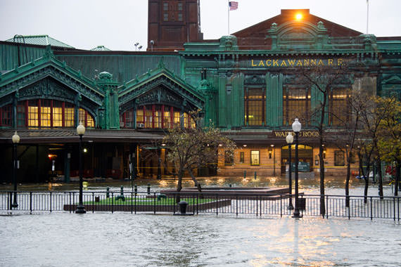 The Hudson River swells and rises over its banks flooding the Lackawanna train station in Hoboken, New Jersey, on October 29, 2012. (AP Photo/Charles Sykes)