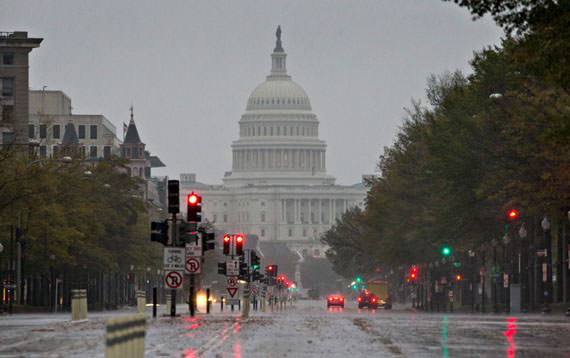 The U.S. Capitol and Pennsylvania Avenue, on Monday morning, October 29, 2012, as heavy rain from Hurricane Sandy arrives in Washington. Sandy strengthened before dawn and is on a predicted path toward Washington, Baltimore, Philadelphia and New York -- putting it on a collision course with two other weather systems that would create a superstorm. (AP Photo/J. Scott Applewhite)